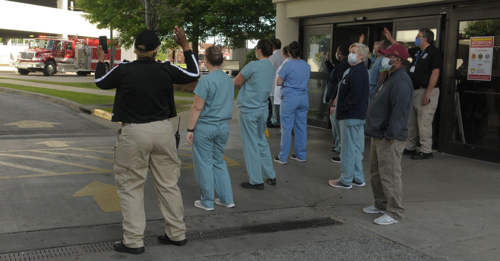 First responders give rolling salute to local health care workers